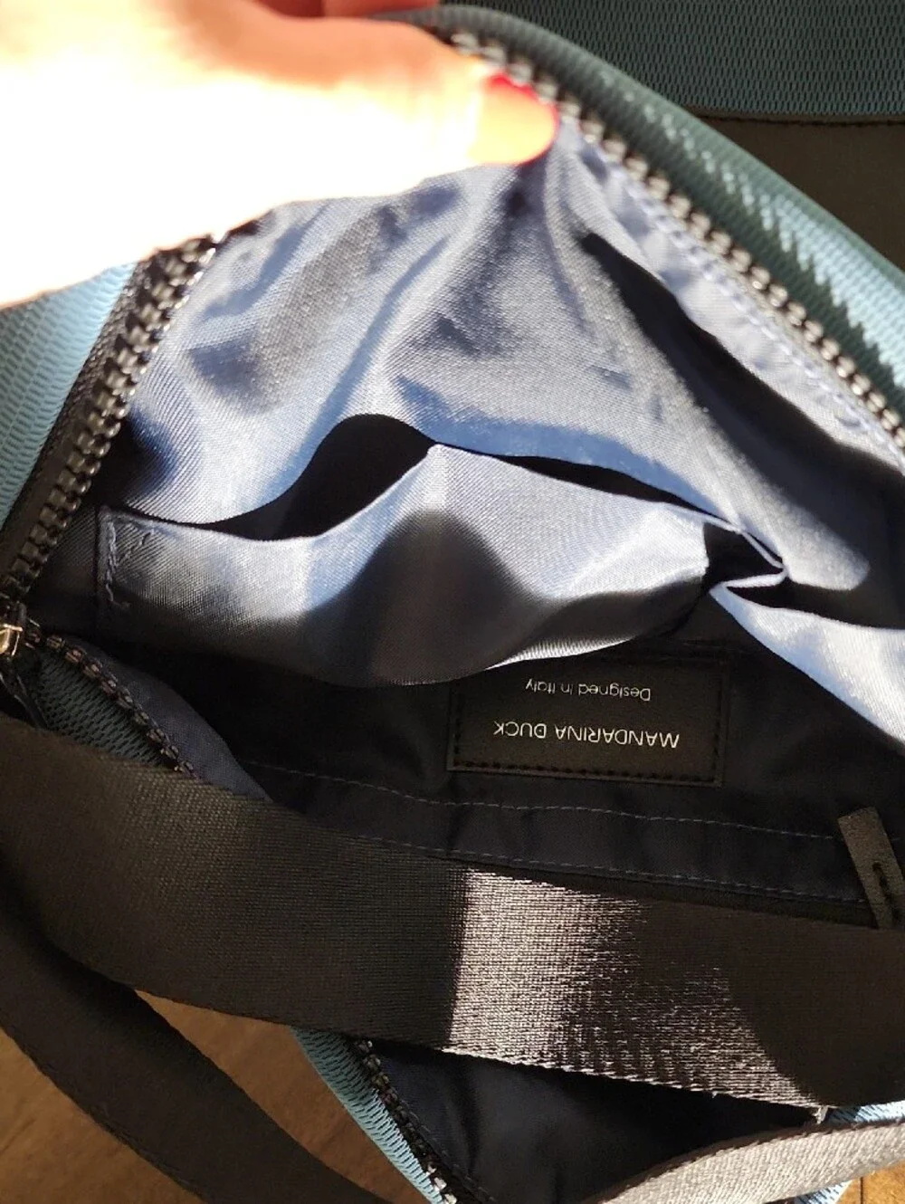 Mandarina Duck Blue Crossbody Backpack with Black Front Pocket